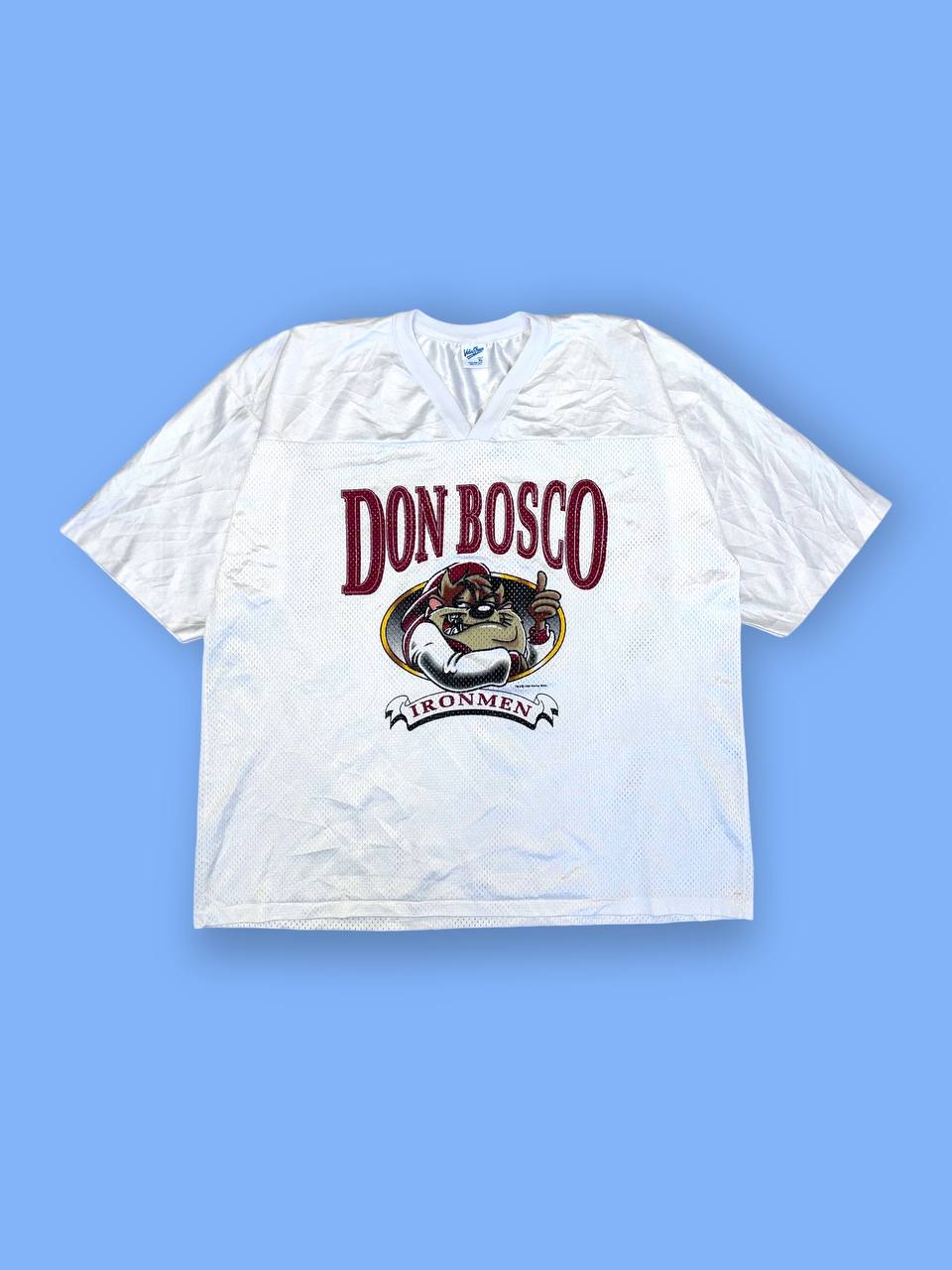 Джерси 1996 года «Don Bosco» с Тасманским Дьяволом из «Looney Tunes»